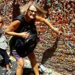 Adding gum to the "Gum Wall" at Pike Market