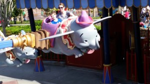 Jenni and Corbin enjoying Dumbo ride